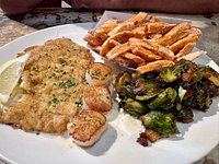 Pismo's Coastal Grill signature dishes  Fish and Chips, various Grilled Fresh Fish selections, Oysters on the Half Shell, Clam Chowder, Seafood Tacos.